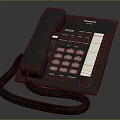 Elegant Panasonic Corded Telephone Featuring Keypad Handset And Coiled Cord