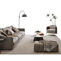 Brown Leather Sofa And Round Coffee Table Set With Floor Lamp Armchair Ottoman And Potted Plant