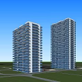 High Rise Office Buildings With Green Lawn Surrounding Roads And Adjacent Structures