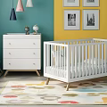 White Baby Crib In Nursery With Teal Yellow Walls White Dresser Colorful Rug