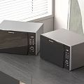 Two Modern Panasonic Microwave Ovens on Kitchen Countertop with Sleek Design 3d model