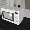 White Modern Microwave Oven Kitchen Appliance With Digital Display On Dark Countertop