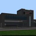 Industrial Factory Building With Green Lawn Surroundings Multiple Structures Parking Area And Road