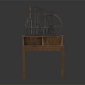 Vintage Industrial Machinery Model With Metal Structure And Large Wheel On Wooden Table