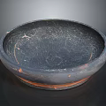 Hand Carved Black Clay Basin With Cracked Surface And Orange Rim