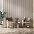 Modern Two Chairs And Small Round Table Set With Wooden Striped Wall And Herringbone Floor