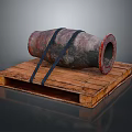 Old Rusted Cannon Secured With Black Straps On Wooden Pallet