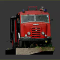 Red And Gray Fire Truck Model With Red Wheels Emblem Display Base And Green Grass