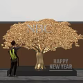 Popular Photo Spot with Golden Tree NBC Logo and Happy New Year Decorations