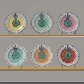 Colorful Decorative Plates With Fruit Slice Patterns Arranged On Wooden Shelves And Blue Edges