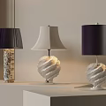 Stylish Table Lamps Featuring Black Beige Shades And Decorative Textured Bases On