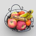 Black Wrought Iron Basket Filled With Fresh Bananas Apples And Oranges