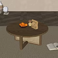 Round Wooden Coffee Table With Woven Detail Oranges Jar Brown Bag Open Book on Carpet
