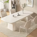 Modern White Dining Table Set With Oval Top Simple Chairs And Decorative Vase Plants