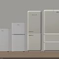White Modern Refrigerators and Freezers of Various Sizes Arranged in a Kitchen with Wooden Floor