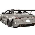 White BMW F201M Race Car With Large Rear Wing And Sporty Exterior Design