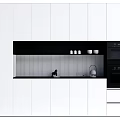 Modern Kitchen Interior With White Cabinets Black Appliances And Striped Backsplash