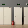 White Fire Doors With Emergency Exit Signs And Red Fire Extinguisher In Interior