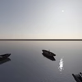 Three Wooden Boats Floating on Calm Water with Sunlight Reflection and Clear Sky and Horizon