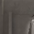 Modern Flowing Yuhe Clothing Store with Clothing Mannequins Green Chairs and Display Area