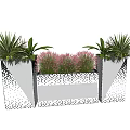 Modern Geometric Patterned Flower Planters With Green Plants And Pink Flowers
