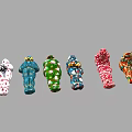 Assorted Stuffed Toys In Vibrant Colors And Unique Patterns