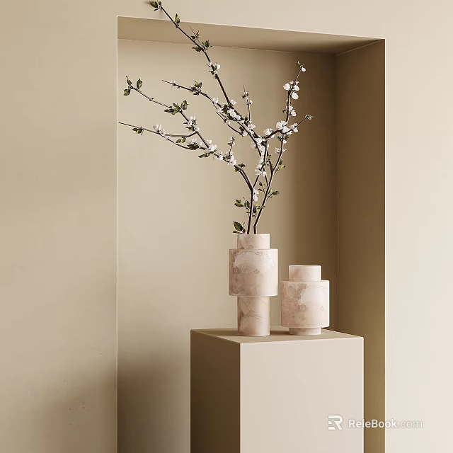 Elegant Stacked Marble Vases With White Blossom Branches On Light Pedestal Against Neutral Wall 3d model 