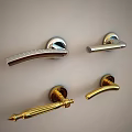 Elegant Metal Door Handles In Gold And Silver With Modern Classic Designs On Wall