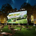 Outdoor Night Stage With Starry Sky Trees Grass Large Screen Camping Games And Tables