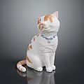 Orange and white cat figurine sitting on dark reflective surface with beaded collar and pendant