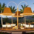 Outdoor Camping Tent With Palm Trees Tables Chairs And Mountain View Landscape Area