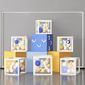 Colorful Geometric Art Installation with Transparent Cubes Containing Spheres And Letters