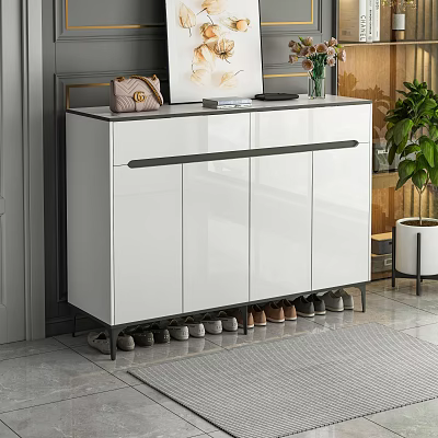 Modern White Shoe Cabinet Design With Metal Legs Decorative Items On Top And Shoes Below 3d model