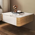Double Bed With White Upholstered Headboard Plaid Blanket Beige Brown Pillows And White Nightstands