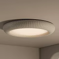 Modern Round Ceiling Light with Textured Pattern and Soft Illumination