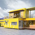 Yellow Container Tourist Center Building With Balcony Glass Facade And Outdoor Area