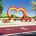 Scenic Waterfront Landscape With Red Heart Shaped Arch Bicycle Lane Trees And Benches