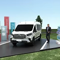 White Commercial Van With Man Standing Near Directional Signs On Grass