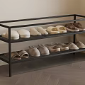 Neutral Colored Shoes on Three Tier Black Shoe Rack with Indoor Wooden Floor