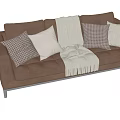 Modern Brown Leather Three Seater Sofa With Patterned Pillows And Throw Blanket 3d model