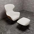 White Upholstered Accent Chair With Wooden Frame And Ottoman In Patterned Wallpaper Marble Floor Setting