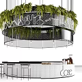 White Bar Counter with Hanging Circular Green Plants Decoration and Black Stools in Cafe