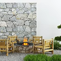 Landscape Seating With Wooden Chairs Circular Fire Pit Stone Wall And Green Plants