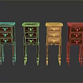 Four Different Colored Small Wooden Cabinets With Drawers And Slender Legs On Dark Background