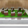 Commercial Display Equipment With Marble Top And Wooden Background Featuring Building Models On Green Lawn