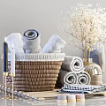 Luxury Bathroom Accessories Setup With Towels Candles And Woven Baskets