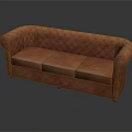 Elegant Orange Quilted Leather Sofa With Rounded Arms And Timeless Design