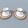 Elegant White Cups With Gold Rim And Saucers On Light Blue Background