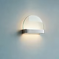 Modern Wall Lamp With Curved Glass Shade And Metal Base For Home Lighting
