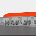 Industrial Factory Building With Red And White Roof And Parked Gray Vehicles